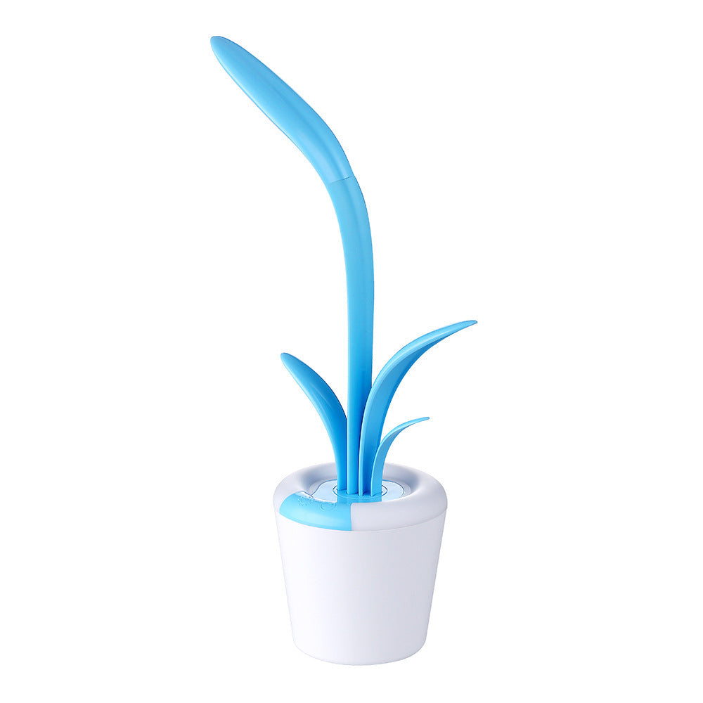 Blue silicone straw with white base on a white background